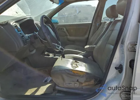 2002 Infiniti G20 z USA, uszkodzony, nr VIN JNKCP11A82T506486